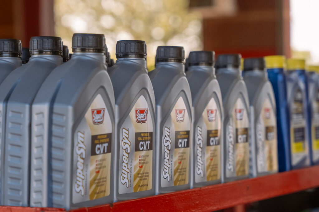 Motor oil bottles used for summer oil changes at Kwik Kar Denton