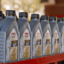 Motor oil bottles used for summer oil changes at Kwik Kar Denton
